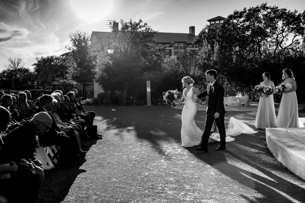 bride loses her veil during the recessional at a JW Marriott wedding