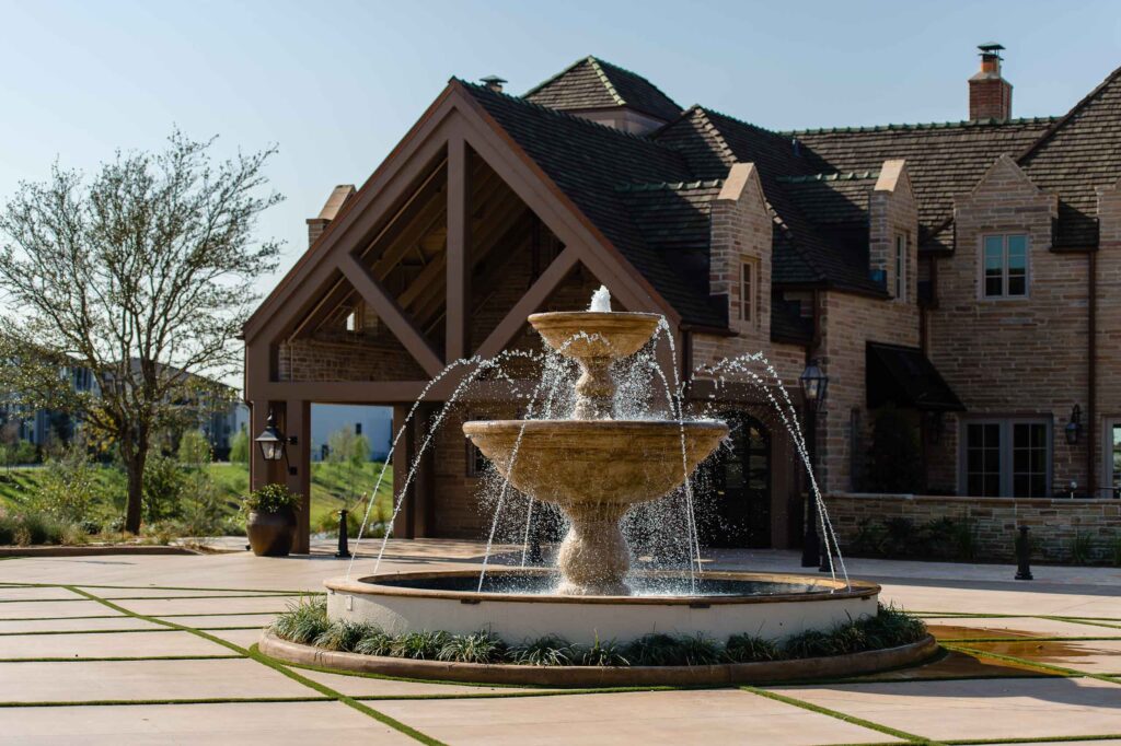 water feature in front of the red berry 