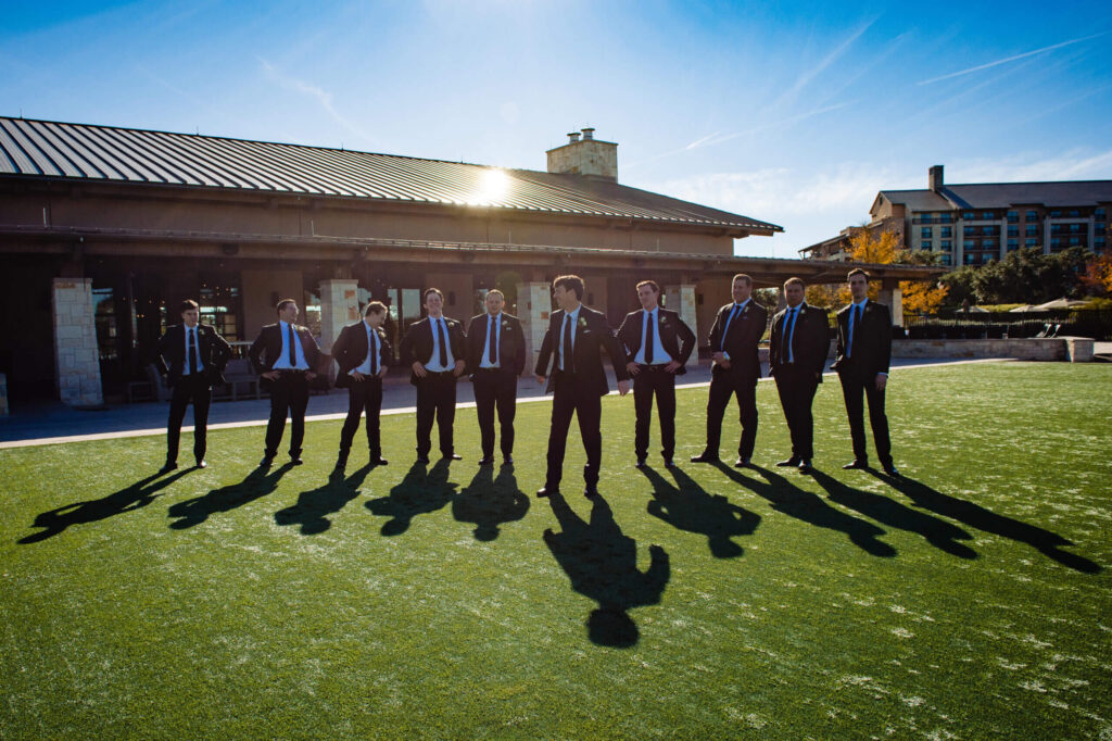 groomsmen having fun pre-ceremony at a JW Marriott wedding in San Antonio, Texas