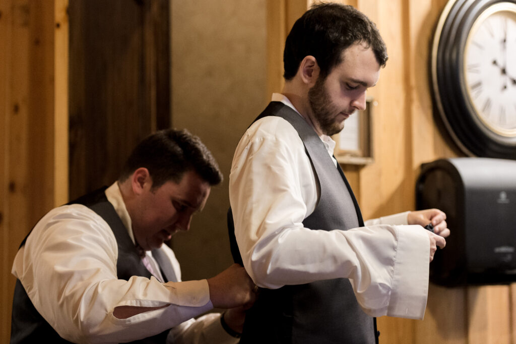 groom getting dressed at The Milestone New Braunfels