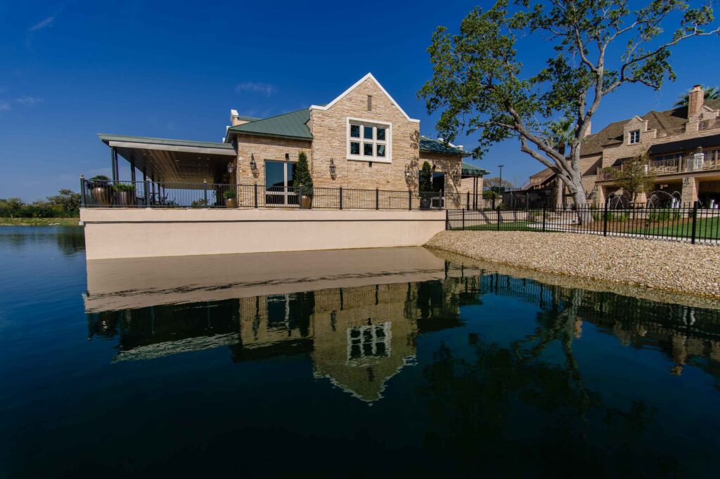 view from the lake looking at the lakeside pavilion at the red berry estate