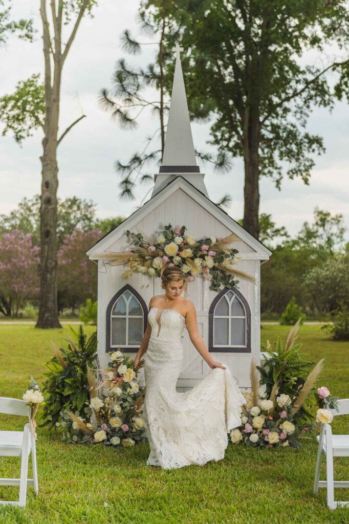 bride in front of the texas traveling wedding chapel