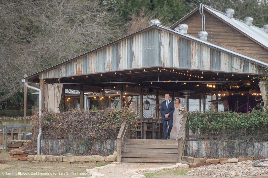 this is an image of a father getting ready to walk his daughter down the aisle at gruene estate wedding in new braunfels texas hill country wedding by san antonio wedding photographers _4S10011