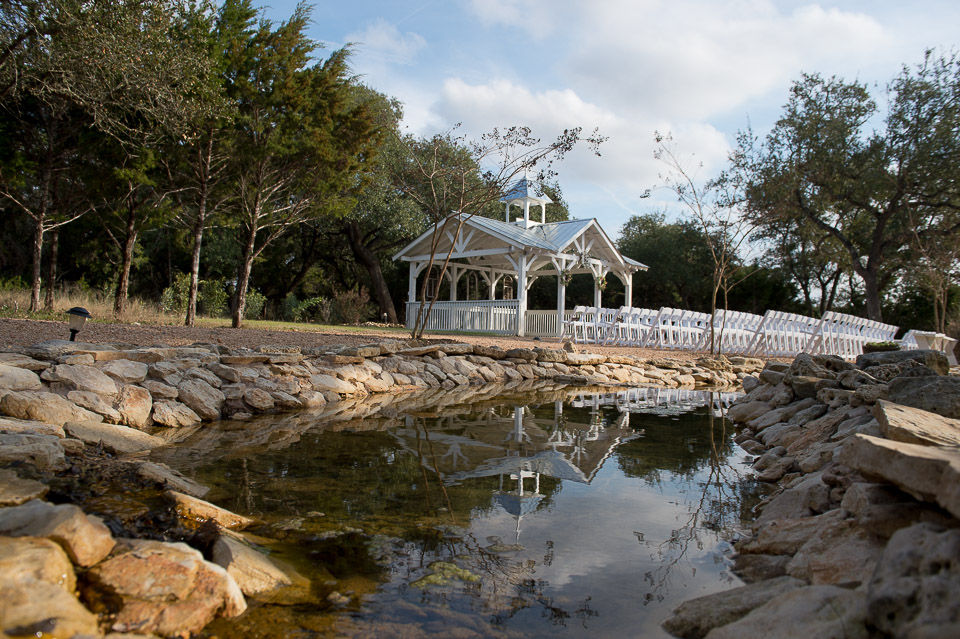 a gorgeous shot of the outdoor wedding ceremony site at western sky