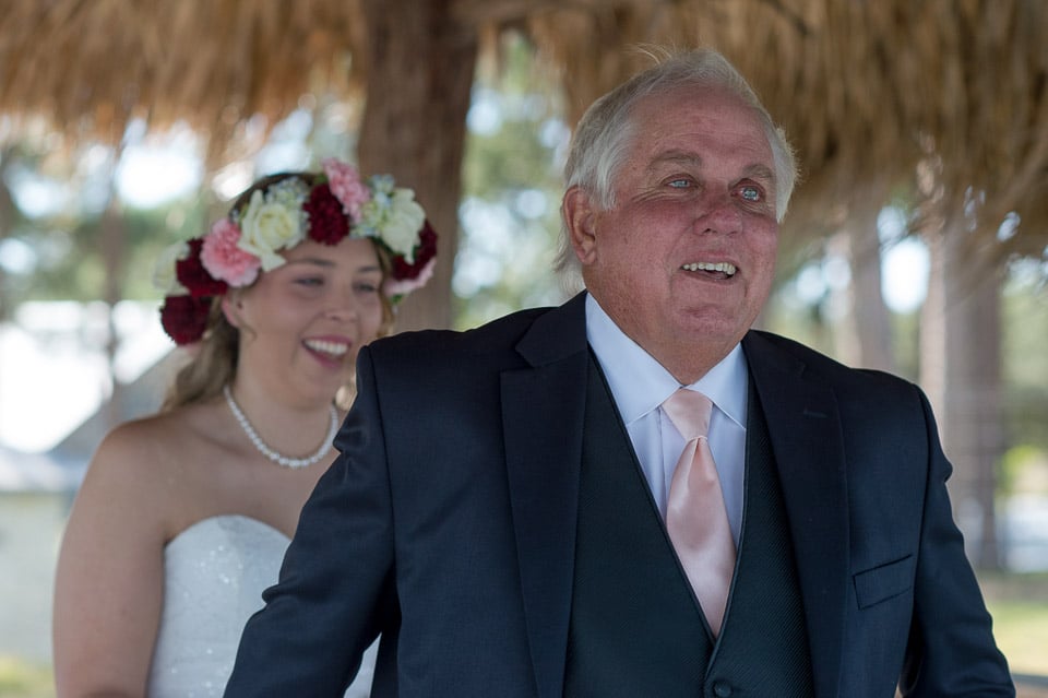 first look with young bride and dad at strawberry pines wedding venue in poteet texas by San Antonio TX Wedding Photographer Tammy Blalock, Ata-Girl Photography Co.