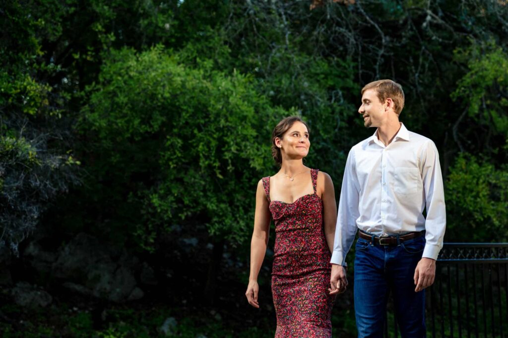 couple walking hand in hand in landa park in new braunfels by San Antonio TX Wedding Photographer Tammy Blalock, Ata-Girl Photography Co.